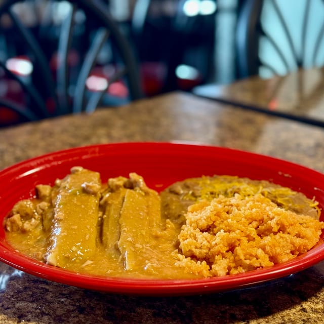 Smothered Tamale Plate.