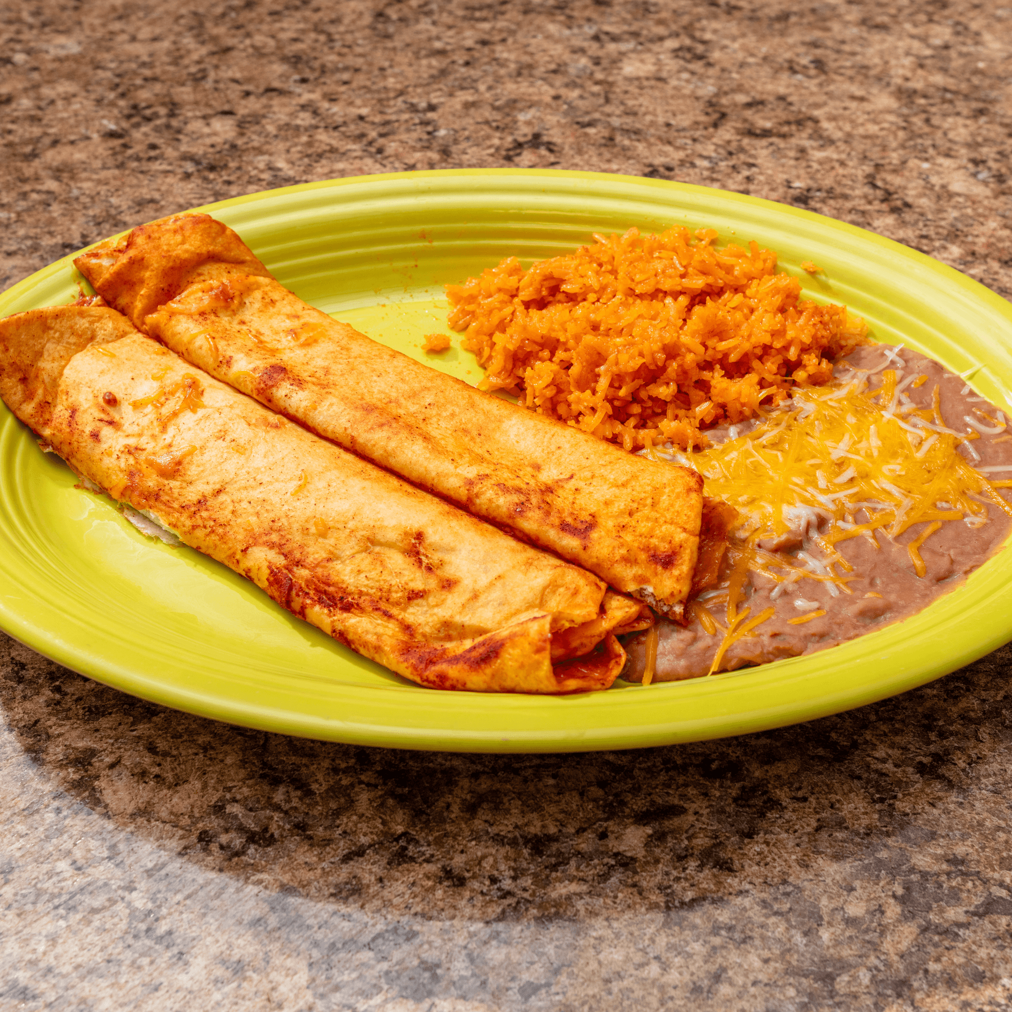 2 Beef Enchiladas Rice & Beans.